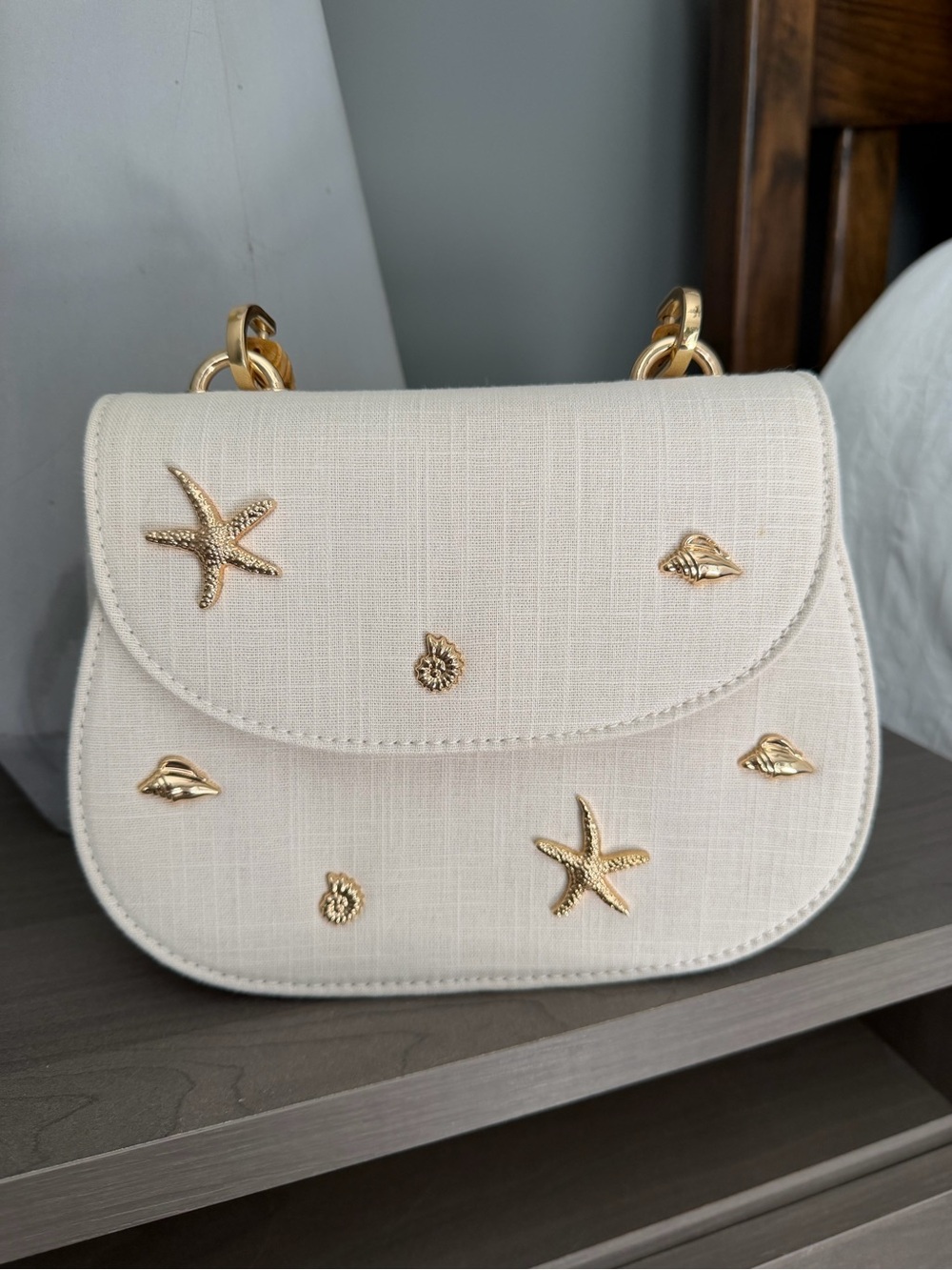 a new day Cream Mini Crossbody with Gold Seashell Accents